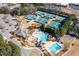 Aerial shot of community pool, tennis courts, and well-manicured landscaping at 1037 Windermere Xing, Cumming, GA 30041