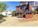 Spacious backyard with a deck, patio, and detached garage at 1037 Windermere Xing, Cumming, GA 30041