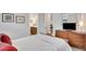 Bedroom features a view into the ensuite bathroom and dresser with TV at 174 Vandiver Ct, Acworth, GA 30101