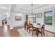 Inviting dining area features hardwood floors, natural light, and neutral color palette at 174 Vandiver Ct, Acworth, GA 30101