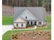Charming single-Gathering home with well-manicured lawn and attractive brick and siding exterior at 174 Vandiver Ct, Acworth, GA 30101