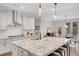 Spacious kitchen with stainless steel hood, granite countertops, and pendant lights at 174 Vandiver Ct, Acworth, GA 30101