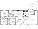 Detailed floor plan showcasing the layout of the home, including bedrooms, kitchen, and living spaces at 5623 Crestwood Dr, Stone Mountain, GA 30087