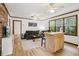 Bright living room with hardwood floors, modern furniture, and ample natural light at 5623 Crestwood Dr, Stone Mountain, GA 30087