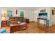 Comfortable living room with hardwood floors, natural light, and a relaxing atmosphere at 5623 Crestwood Dr, Stone Mountain, GA 30087