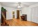 Office with hardwood floors and a small doorway into the attached bathroom at 5623 Crestwood Dr, Stone Mountain, GA 30087