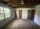 Bedroom showcasing bright natural light from the window, bare walls, and closet space at 2890 Bianca Ct, Decatur, GA 30034