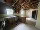 Spacious kitchen area with older cabinets and appliances, awaiting renovation and personalization at 2890 Bianca Ct, Decatur, GA 30034