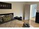 Bedroom featuring a platform bed, hardwood floors, and view to an open door at 300 Peachtree St # Apt 9D, Atlanta, GA 30308
