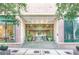 Building entrance with '300' address, glass doors, and stone stairs at 300 Peachtree St # Apt 9D, Atlanta, GA 30308