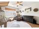 Adorable bedroom offers natural light, ceiling fan, and hardwood floors at 4554 Grenadine Cir, Acworth, GA 30101