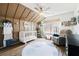 Stylish Bedroom featuring vaulted ceiling, a modern ceiling fan, and wood-look floors at 4554 Grenadine Cir, Acworth, GA 30101