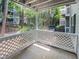 Balcony with wooded views, white lattice, and an outdoor space at 501 Vicksburg Pl, Atlanta, GA 30350