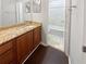 Bathroom with a granite countertop vanity and tiled shower-tub at 501 Vicksburg Pl, Atlanta, GA 30350