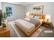 Cozy bedroom with a large window and modern furniture at 501 Vicksburg Pl, Atlanta, GA 30350