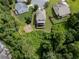 Aerial view of the property nestled among lush trees, highlighting its serene and private setting at 521 Andes Ln, Canton, GA 30114
