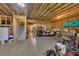 Unfinished basement with exposed wood framing, concrete floor, and potential for customization at 521 Andes Ln, Canton, GA 30114
