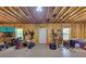 Unfinished basement offers ample space for storage or customization with exterior access at 521 Andes Ln, Canton, GA 30114