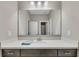 Modern bathroom featuring a white countertop and a large mirror, exuding clean and contemporary style at 521 Andes Ln, Canton, GA 30114