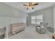 Inviting Bedroom with a crib, comfortable chair, and soft lighting creates a peaceful atmosphere at 521 Andes Ln, Canton, GA 30114