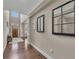 Inviting foyer features hardwood floors, high ceilings, and natural light streaming through the front door at 521 Andes Ln, Canton, GA 30114