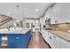 Spacious kitchen with a large island, stainless steel appliances, and a walk-through to another room at 521 Andes Ln, Canton, GA 30114