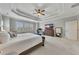 Elegant main bedroom with a trey ceiling, plush carpet, and a relaxing atmosphere at 521 Andes Ln, Canton, GA 30114