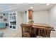 Entertainment room with a bar area and a built-in unit for entertainment at 801 Windsor Rdg, Canton, GA 30115