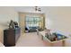 Bedroom featuring playful decor, a neutral color scheme, and plenty of space for activities at 801 Windsor Rdg, Canton, GA 30115