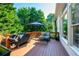 Exterior view of a wooden deck with outdoor furniture and a grill at 801 Windsor Rdg, Canton, GA 30115