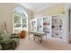 Bright home office with built-in bookshelves, a large window, and comfortable seating at 801 Windsor Rdg, Canton, GA 30115
