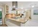 Bright, updated kitchen featuring granite countertops, stainless steel appliances, and ample cabinet space at 1646 Rainier Falls Ne Dr, Atlanta, GA 30329