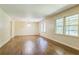 Inviting living room with hardwood floors, recessed lighting, and lots of natural light at 1646 Rainier Falls Ne Dr, Atlanta, GA 30329