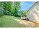 The backyard features a well-maintained lawn and a deck, perfect for outdoor relaxation and entertaining at 1658 Pine Glen Cir, Decatur, GA 30035