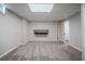 Spacious carpeted basement featuring a drop ceiling, finished walls, and a doorway at 1658 Pine Glen Cir, Decatur, GA 30035
