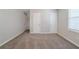 Large bedroom with neutral color palette and natural light at 1658 Pine Glen Cir, Decatur, GA 30035