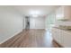 Spacious dining room area with sliding doors to the back deck and stairs to the upper level at 1658 Pine Glen Cir, Decatur, GA 30035