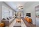 Inviting living room with a plush rug, comfortable seating, and ample natural light at 1658 Pine Glen Cir, Decatur, GA 30035