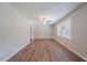 Living room area features a ceiling fan and a window with an exterior view at 1658 Pine Glen Cir, Decatur, GA 30035