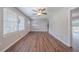 Living area with a view of the yard, a ceiling fan, and neutral walls at 1658 Pine Glen Cir, Decatur, GA 30035