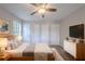 Cozy main bedroom with modern furniture and three closets for ample storage space at 1658 Pine Glen Cir, Decatur, GA 30035