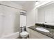 Bathroom with tub/shower combo and granite vanity top at 1691 Holcomb Lake Rd, Marietta, GA 30062