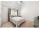 Bright, spacious bedroom with neutral tones and large windows at 1691 Holcomb Lake Rd, Marietta, GA 30062