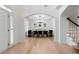 Bright dining room featuring hardwood floors and contemporary chandelier at 1691 Holcomb Lake Rd, Marietta, GA 30062