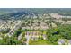 Wide aerial shot of the neighborhood, highlighting community layout and surrounding greenery at 176 Oak Green Dr, Lawrenceville, GA 30044