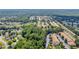 Aerial view of the neighborhood showcasing the home's location and surrounding green spaces at 176 Oak Green Dr, Lawrenceville, GA 30044