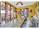 Spacious dining room area with seating for eight and lots of natural light at 176 Oak Green Dr, Lawrenceville, GA 30044