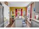 Bright kitchen featuring a center island with granite countertop and barstool seating at 176 Oak Green Dr, Lawrenceville, GA 30044