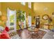 Inviting living area with hardwood floors, large windows, and bright decor at 176 Oak Green Dr, Lawrenceville, GA 30044