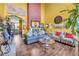 Bright living room featuring hardwood floors, high ceilings, stylish furnishings and decor at 176 Oak Green Dr, Lawrenceville, GA 30044